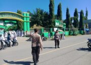 Polsek Rasnaea Barat Polres Bima Kota Melakukan Pengaturan Arus Lalu Lintas di Depan MTS N1 Kota Bima