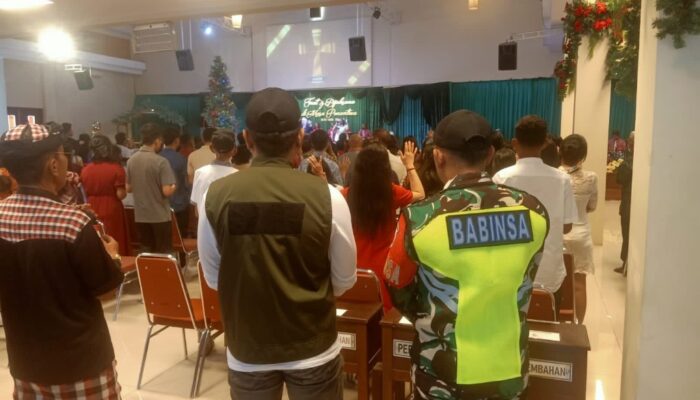 Babinsa, Linmas, dan Pecalang Jaga Natal Damai